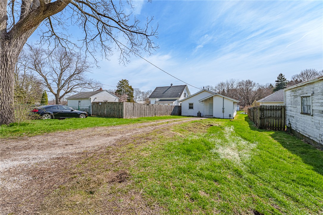 1005 Burt Street Springfield, OH 45505 - Photo 28 of 33 This property features ample outdoor space, a large yard, and surrounding fences, offering privacy and room to grow.