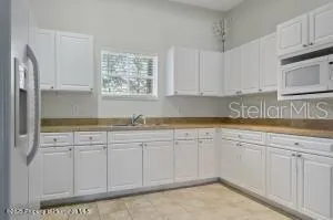 $559,900 | 13761 Weatherstone Drive, Spring Hill, FL 34609