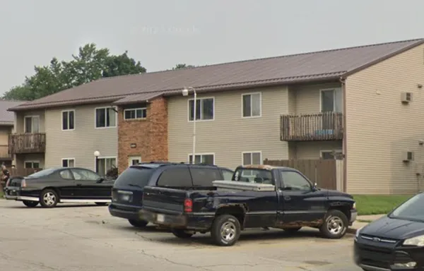 a car parked in front of a house