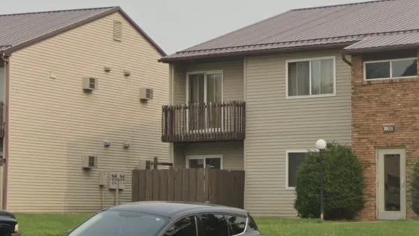a front view of a house with garage