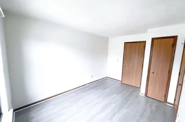 an empty room with windows