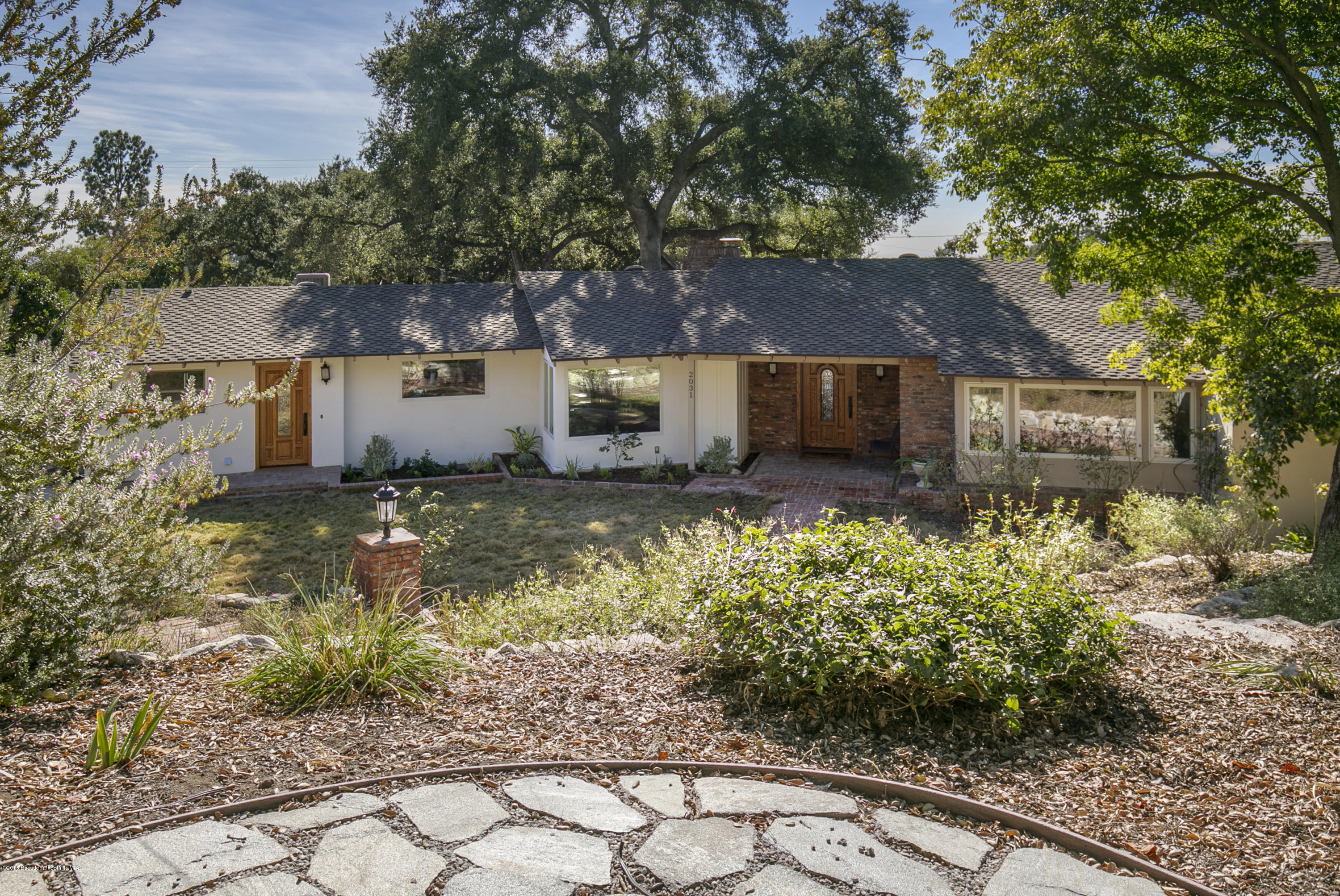 2031 Windover Road Pasadena, CA 91107 - Photo 2 of 56 a front view of a house with a yard