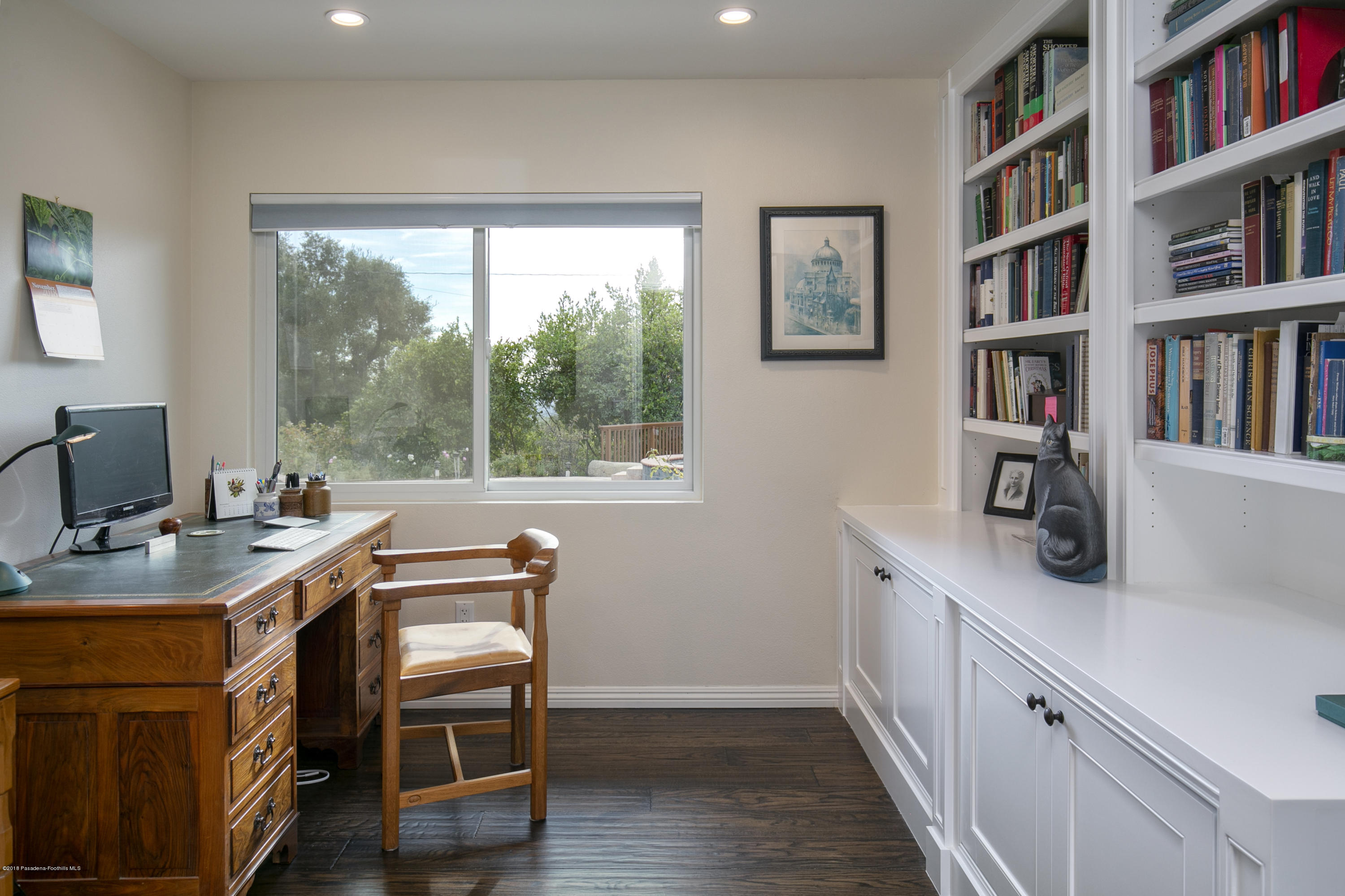 2031 Windover Road Pasadena, CA 91107 - Photo 20 of 56 a view of a workspace with furniture and a bookshelf
