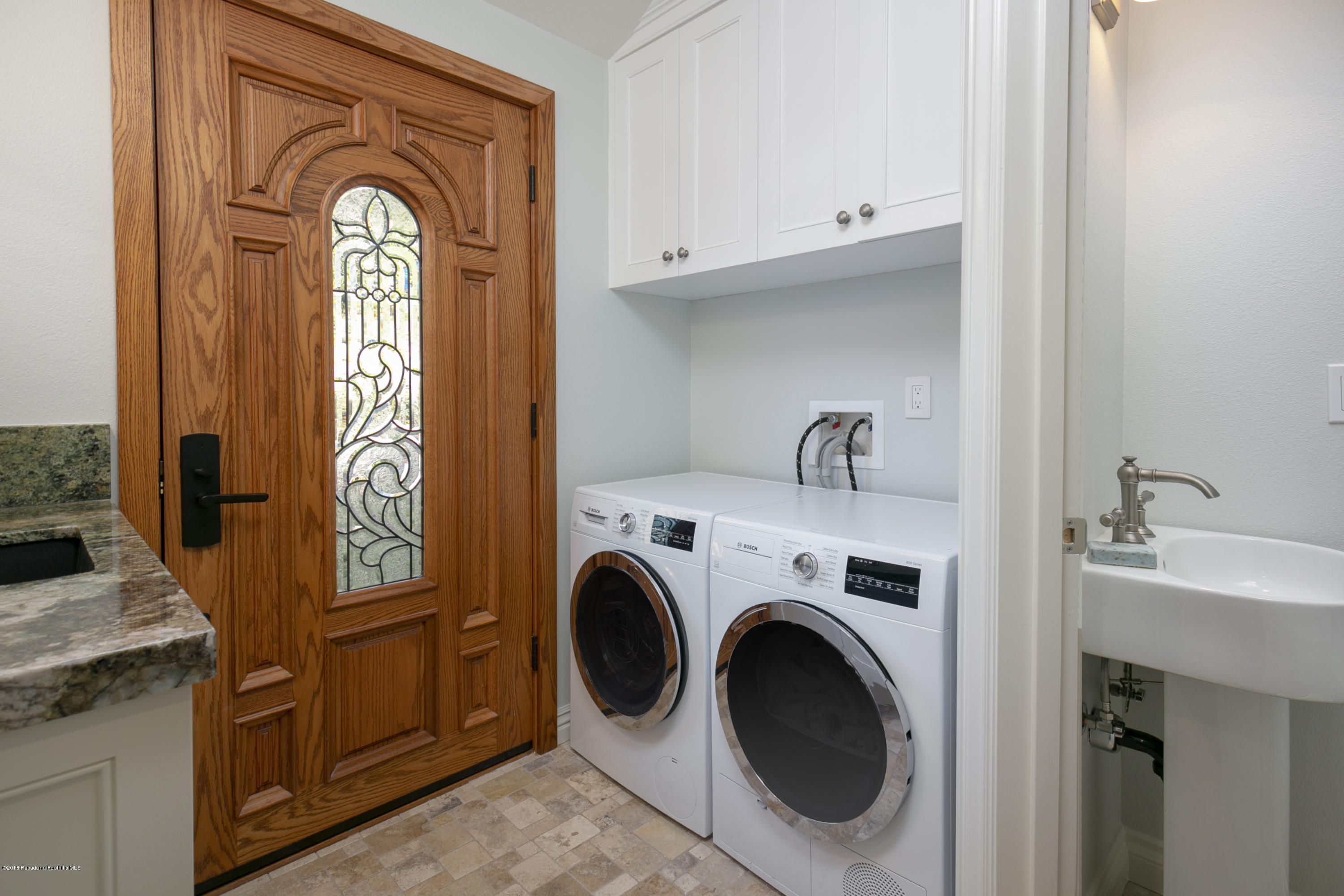 2031 Windover Road Pasadena, CA 91107 - Photo 24 of 56 a view of a kitchen with washer and dryer