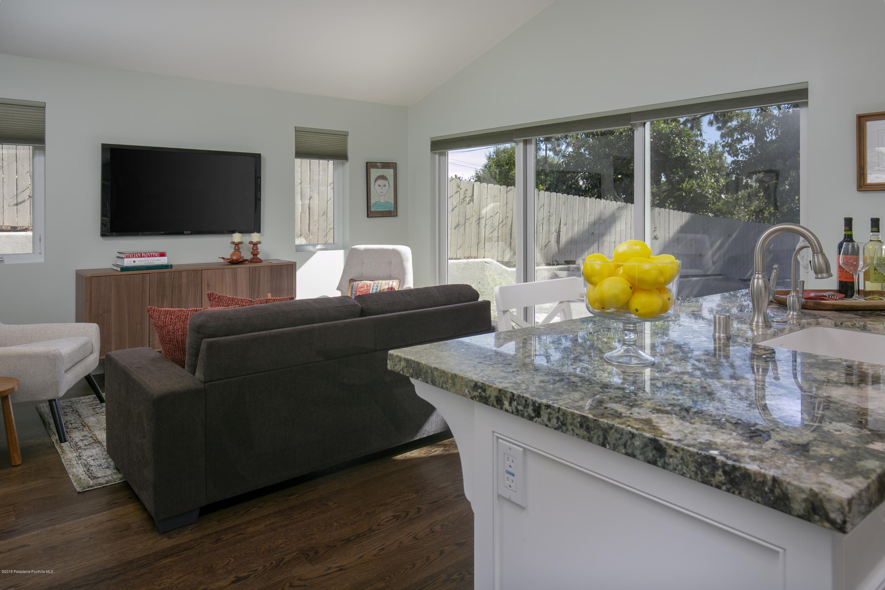 2031 Windover Road Pasadena, CA 91107 - Photo 29 of 56 a living room with furniture and a flat screen tv