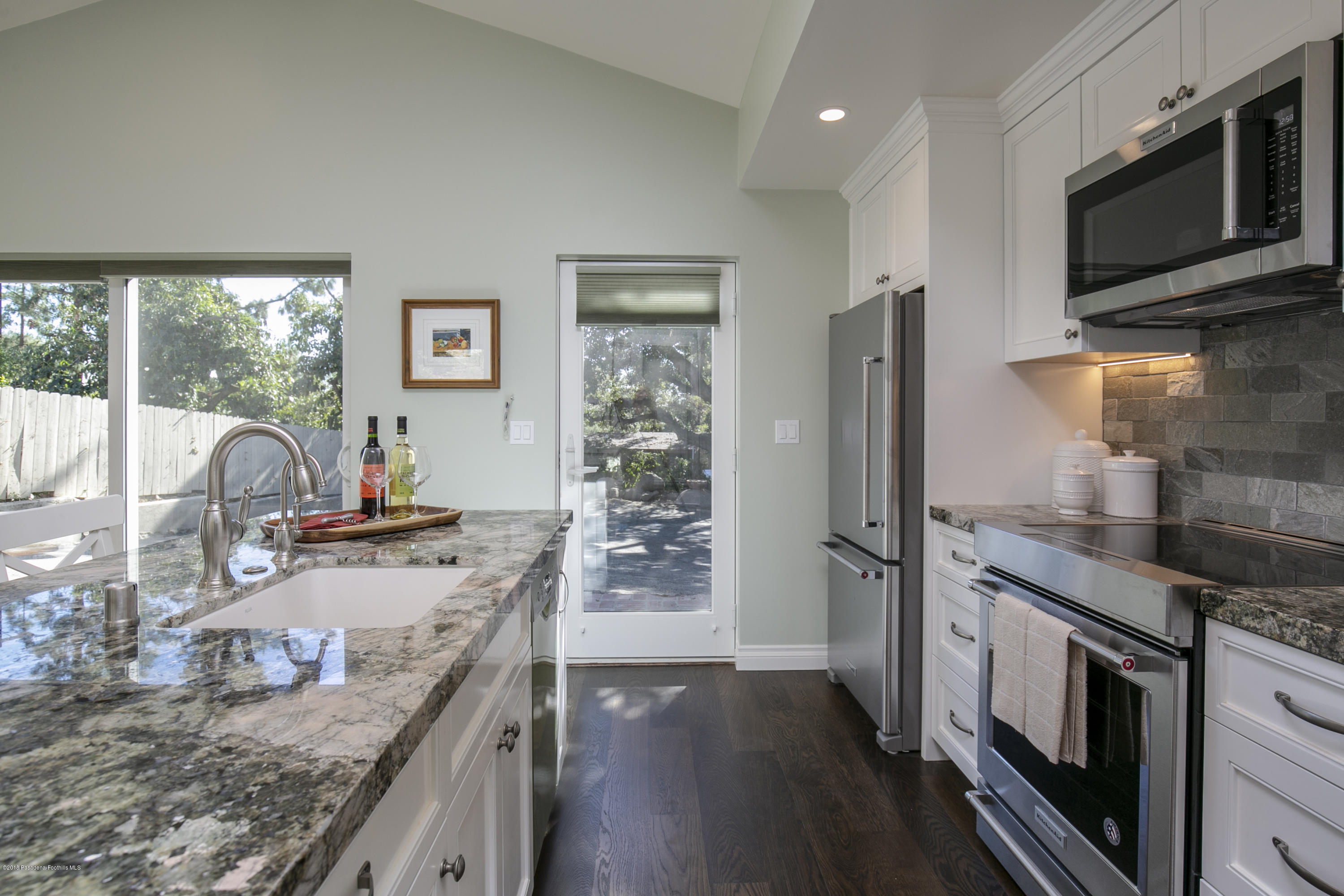 2031 Windover Road Pasadena, CA 91107 - Photo 30 of 56 a kitchen with stainless steel appliances granite countertop a sink stove and refrigerator