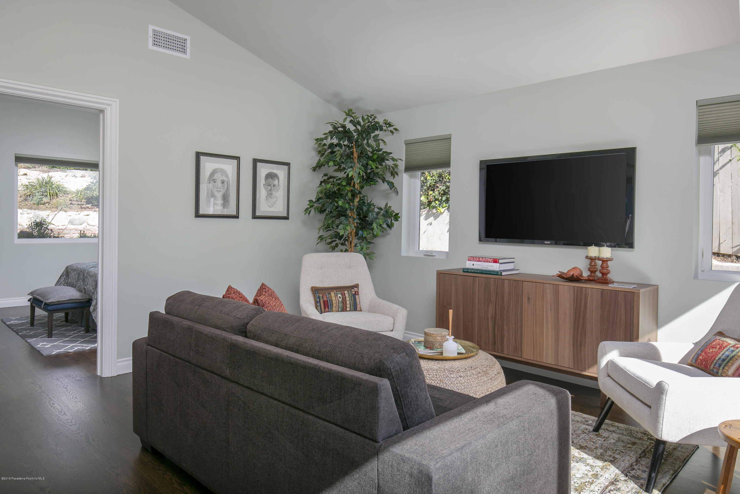 2031 Windover Road Pasadena, CA 91107 - Photo 31 of 56 a living room with furniture and a flat screen tv