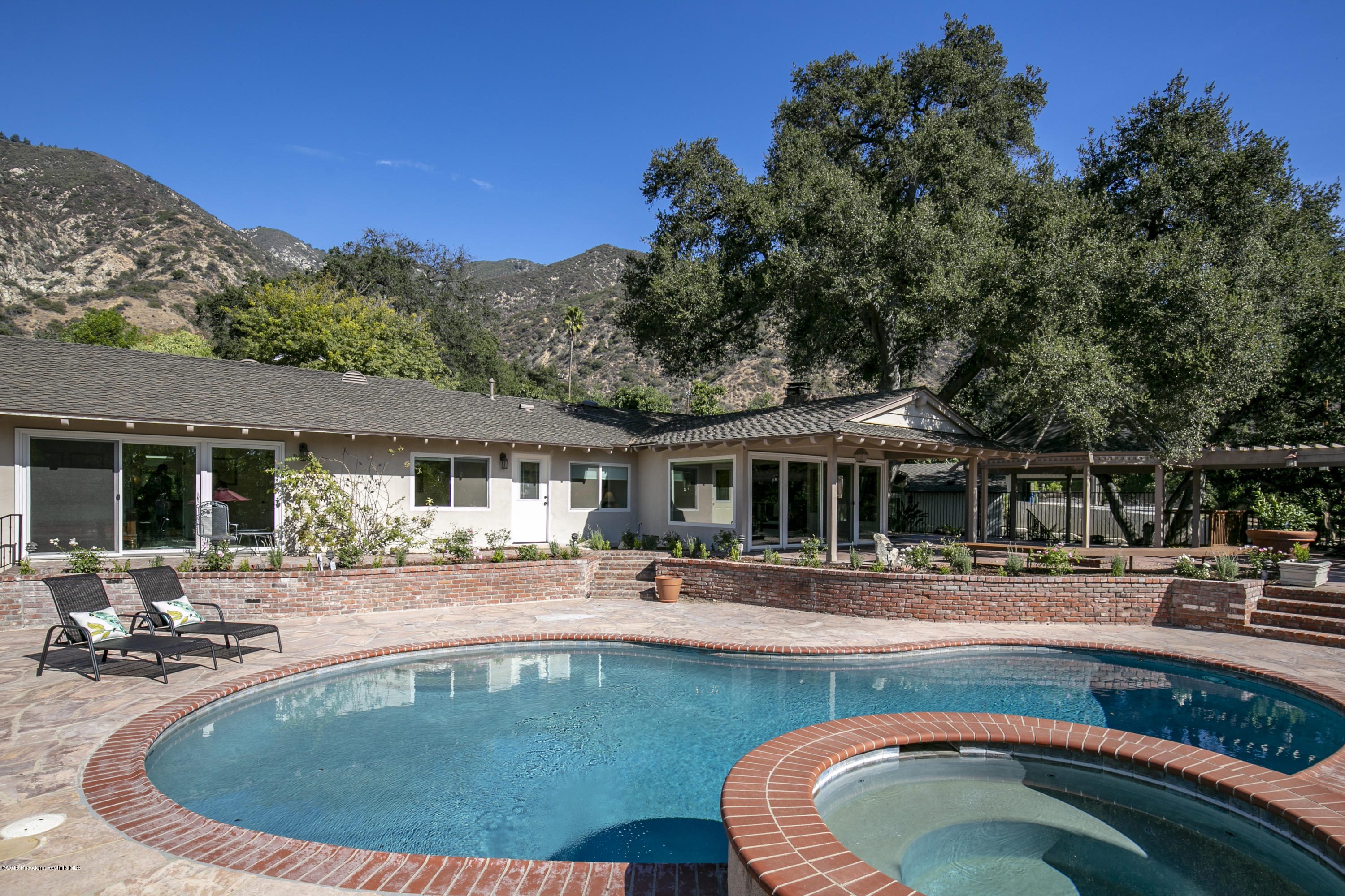 2031 Windover Road Pasadena, CA 91107 - Photo 37 of 56 a view of a house with swimming pool and porch