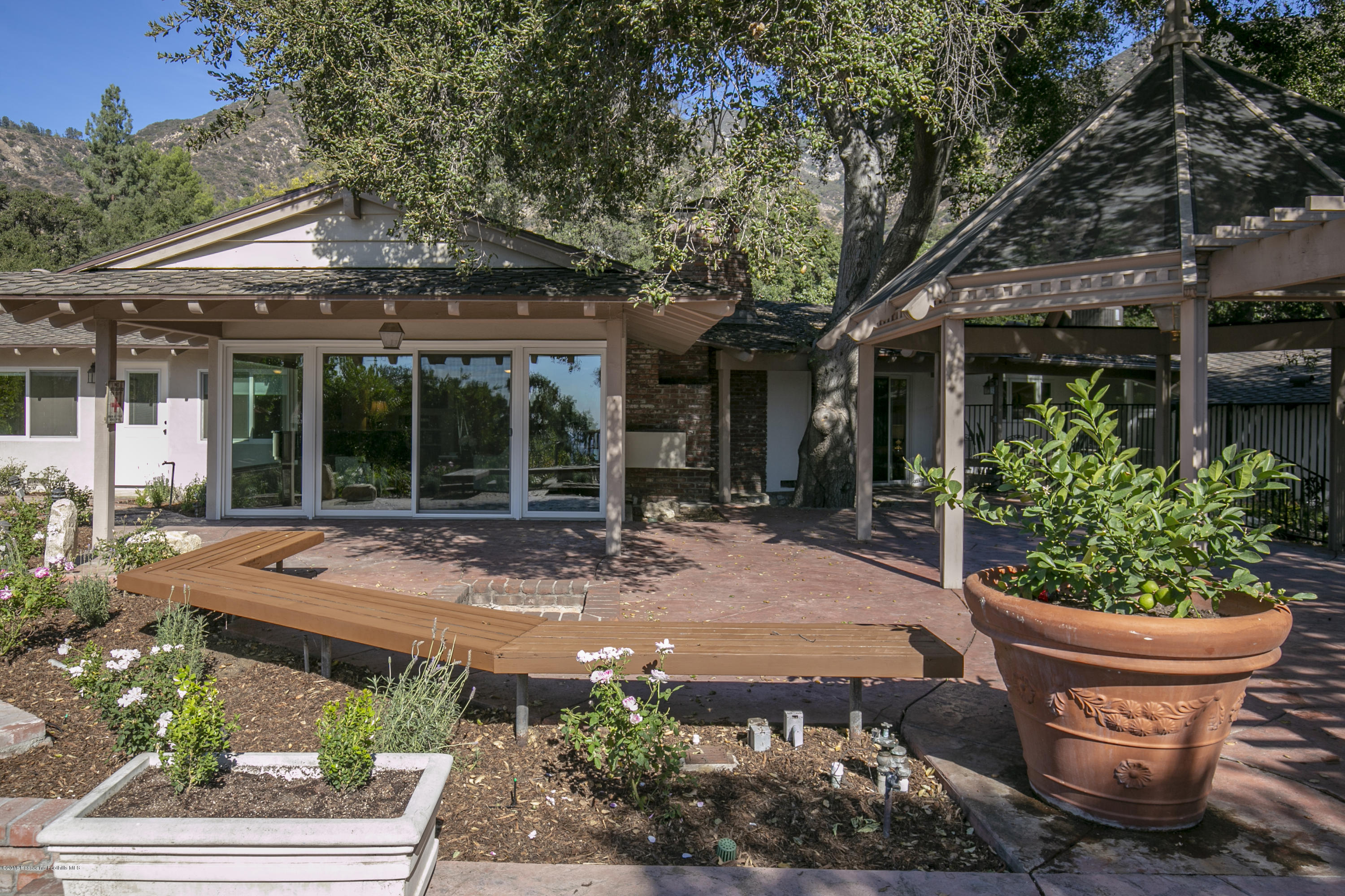2031 Windover Road Pasadena, CA 91107 - Photo 40 of 56 a view of a house with sitting area and garden