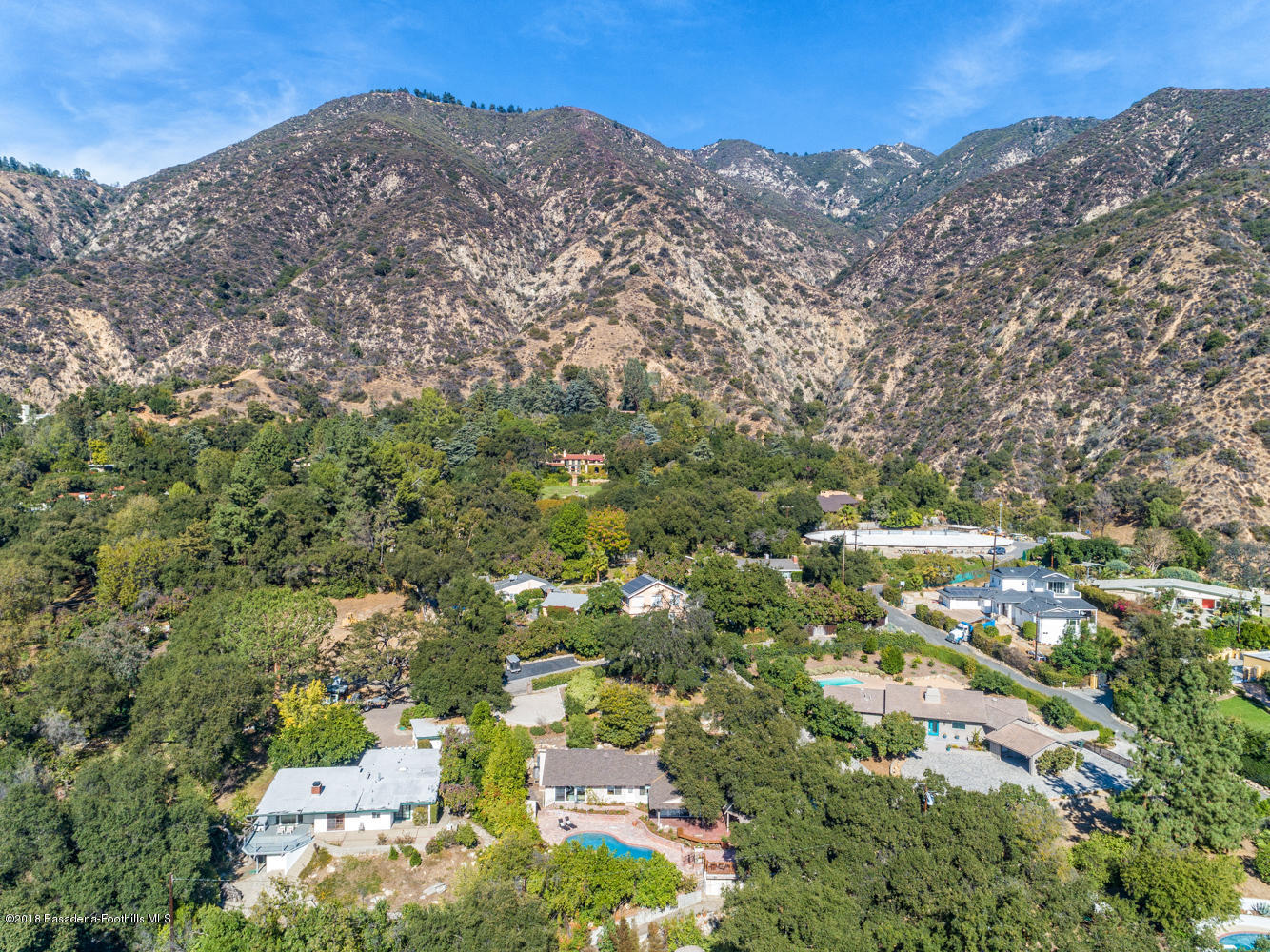 2031 Windover Road Pasadena, CA 91107 - Photo 54 of 56 an aerial view of a houses with a lush green hillside