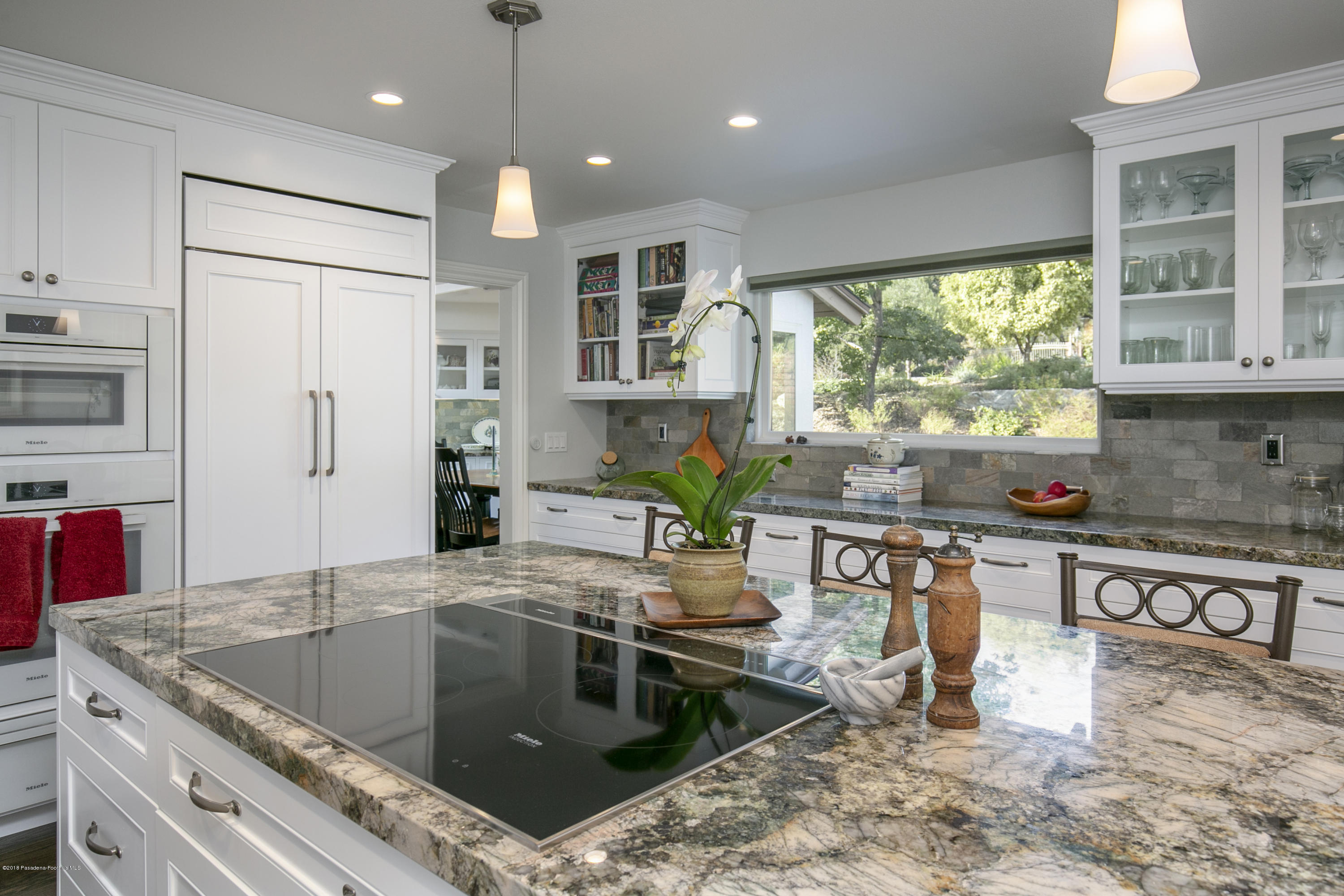 2031 Windover Road Pasadena, CA 91107 - Photo 10 of 56 a kitchen with stainless steel appliances granite countertop a sink a stove and a wooden floors