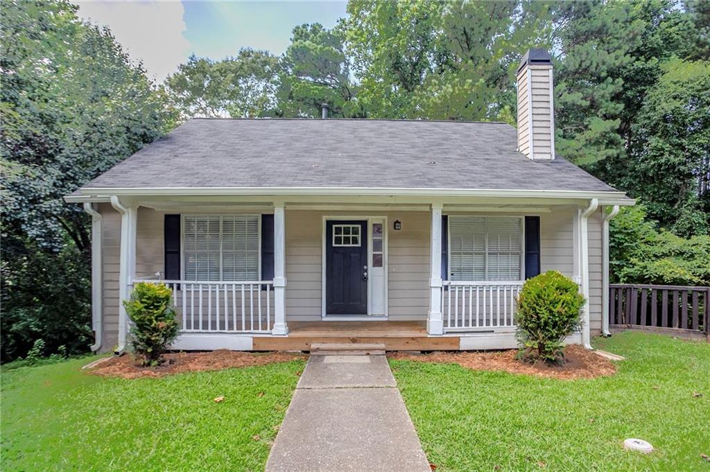 3822 Conley Downs Lane Decatur, GA 30034 - Photo 1 of 46 a front view of a house with garden