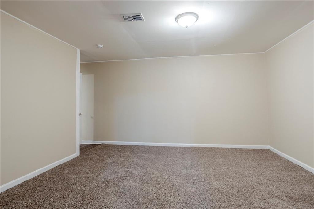 3822 Conley Downs Lane Decatur, GA 30034 - Photo 17 of 46 an empty room with a empty space