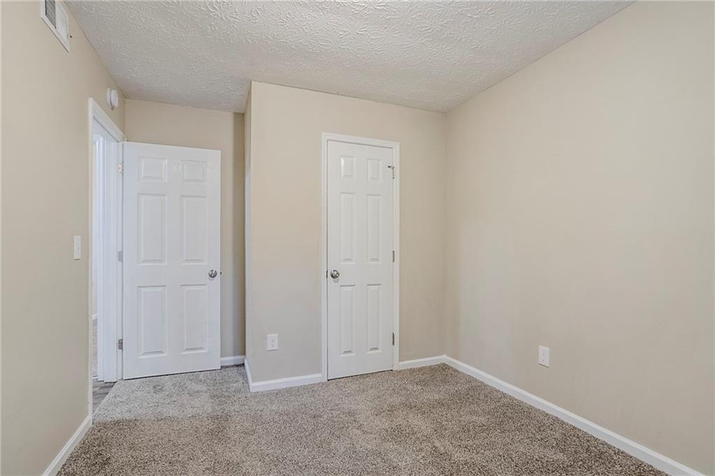 3822 Conley Downs Lane Decatur, GA 30034 - Photo 24 of 46 a view of an empty room