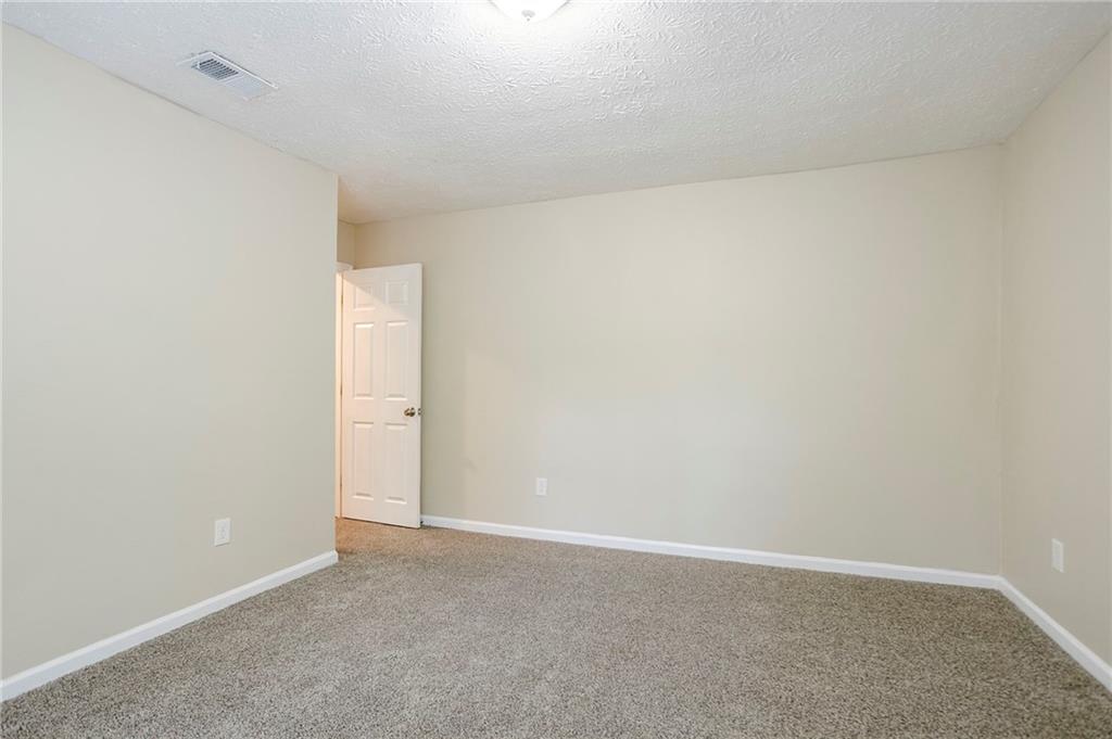 3822 Conley Downs Lane Decatur, GA 30034 - Photo 27 of 46 a view of an empty room