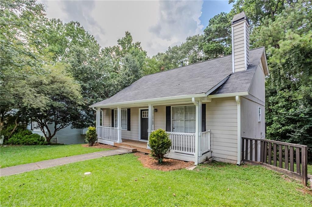 3822 Conley Downs Lane Decatur, GA 30034 - Photo 3 of 46 a view of a house with a yard and plants