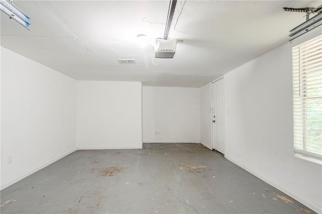 3822 Conley Downs Lane Decatur, GA 30034 - Photo 32 of 46 an empty room with windows
