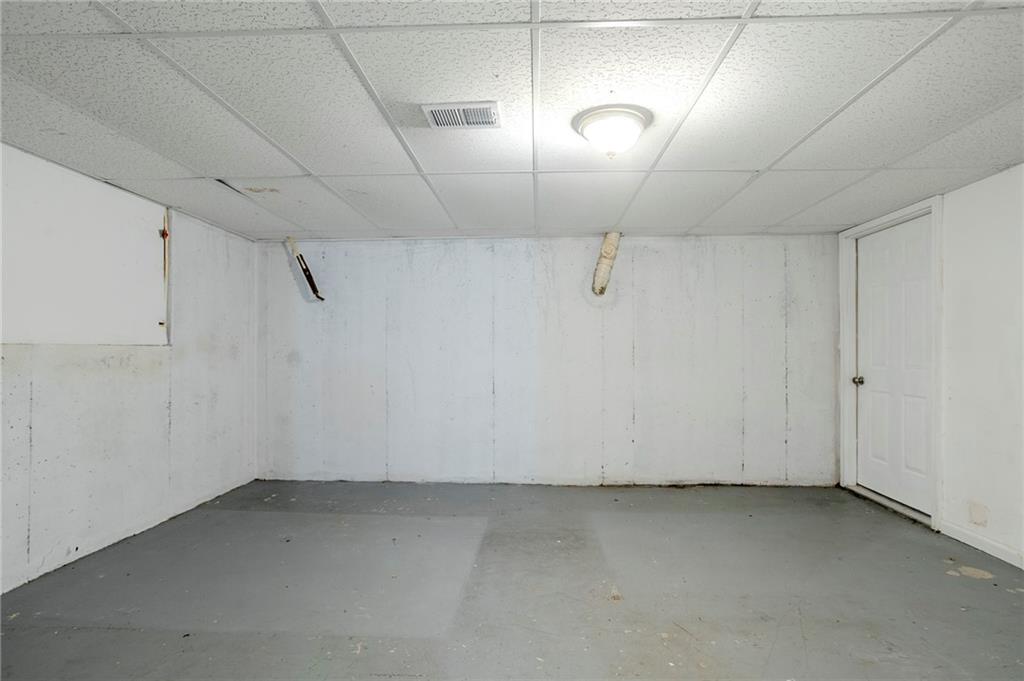 3822 Conley Downs Lane Decatur, GA 30034 - Photo 33 of 46 a view of a room with racks on the wall