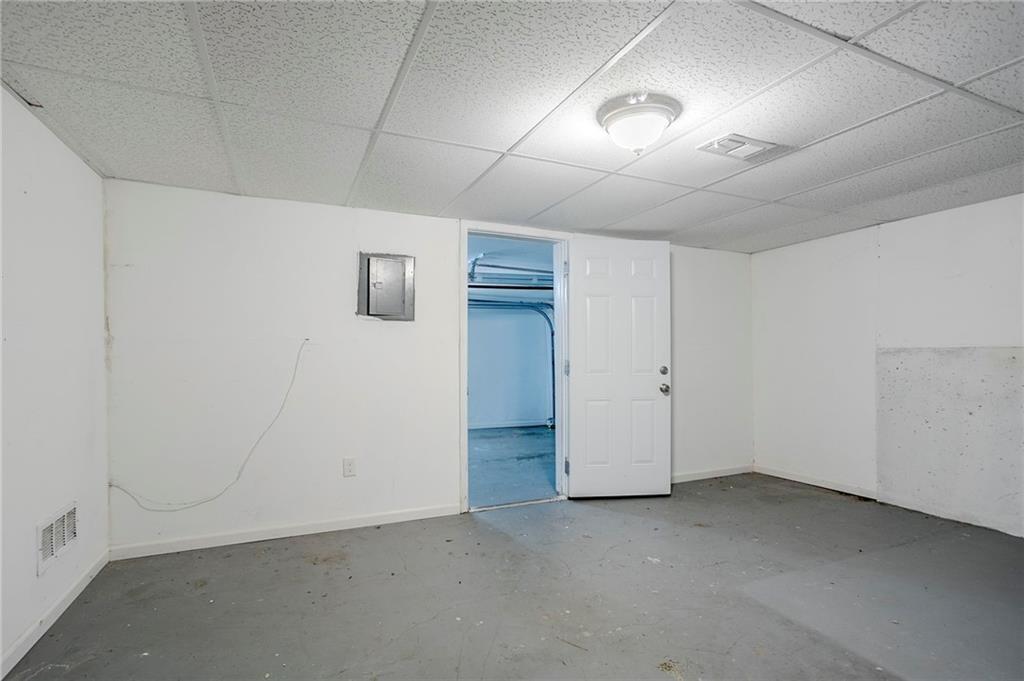 3822 Conley Downs Lane Decatur, GA 30034 - Photo 34 of 46 an empty room with a empty space and windows
