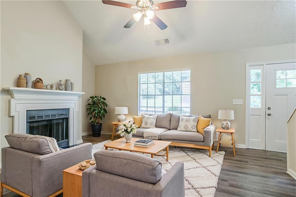 3822 Conley Downs Lane Decatur, GA 30034 - Photo 4 of 46 a living room with furniture and a fireplace