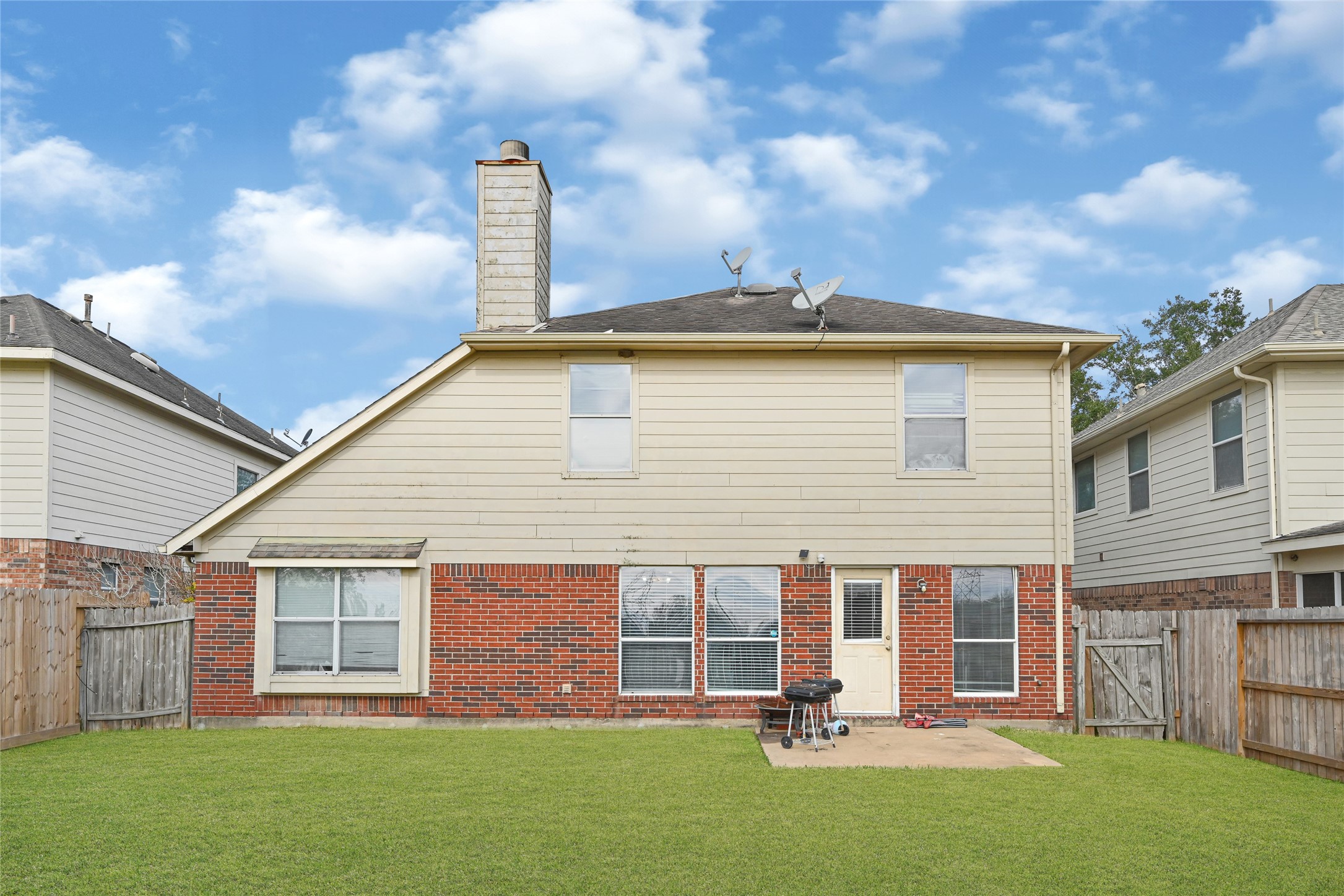 5707 Meadow Breeze Lane Rosharon, TX 77583 - Photo 25 of 26 a front view of house with yard and outdoor seating