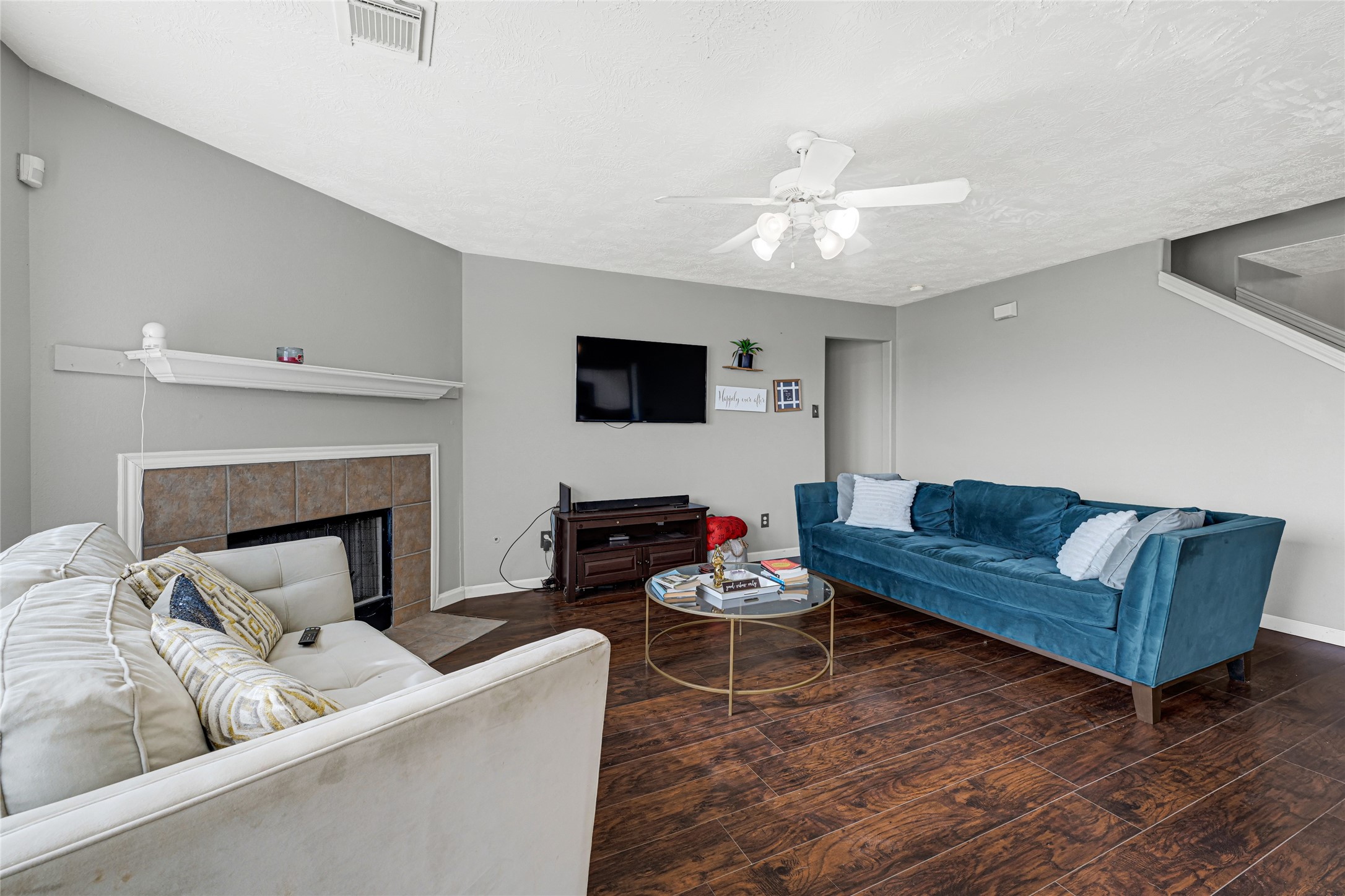 5707 Meadow Breeze Lane Rosharon, TX 77583 - Photo 8 of 26 a living room with furniture and a fireplace