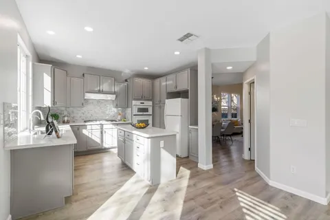 a view of staircase with white walls