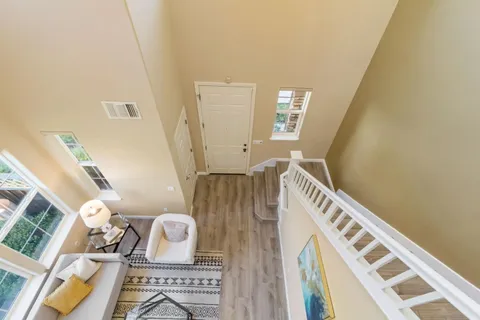 a bedroom with a bed and a couch