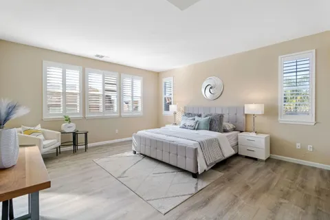 a workspace with furniture and window