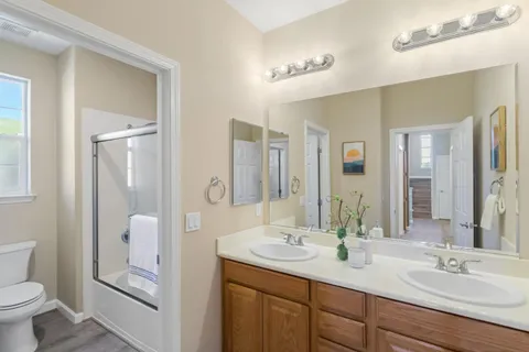 an aerial view of a house having patio