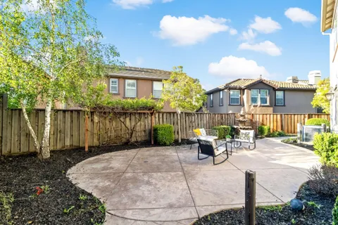 an aerial view of a city with ocean view