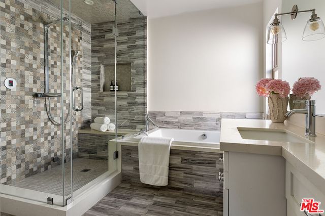 a patio with table and chairs