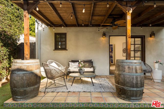 a bathroom with a shower and a sink