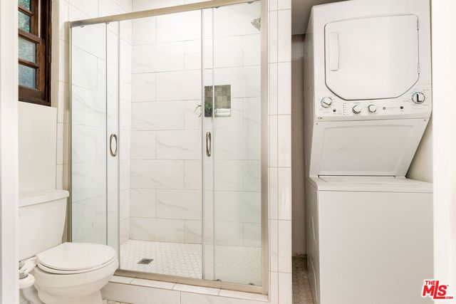 a outdoor living space with furniture and a potted plant