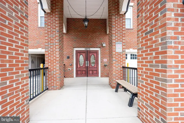 a kitchen with stainless steel appliances a refrigerator stove sink and microwave