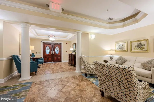 a kitchen with wooden cabinets and stainless steel appliances