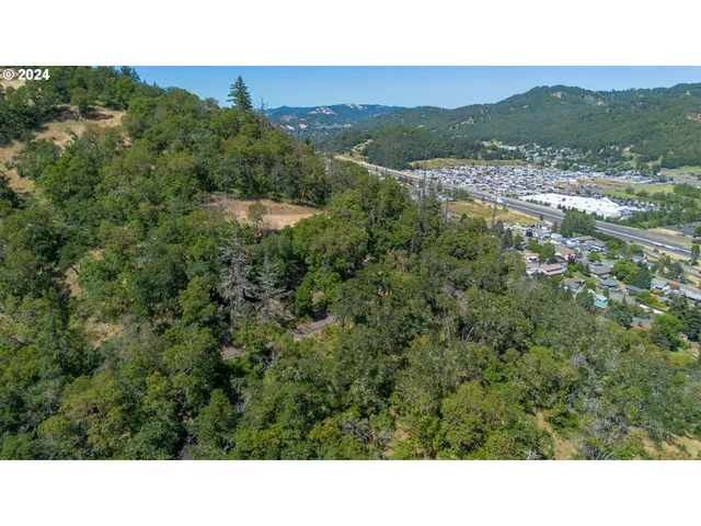 a upper view of a house with a yard