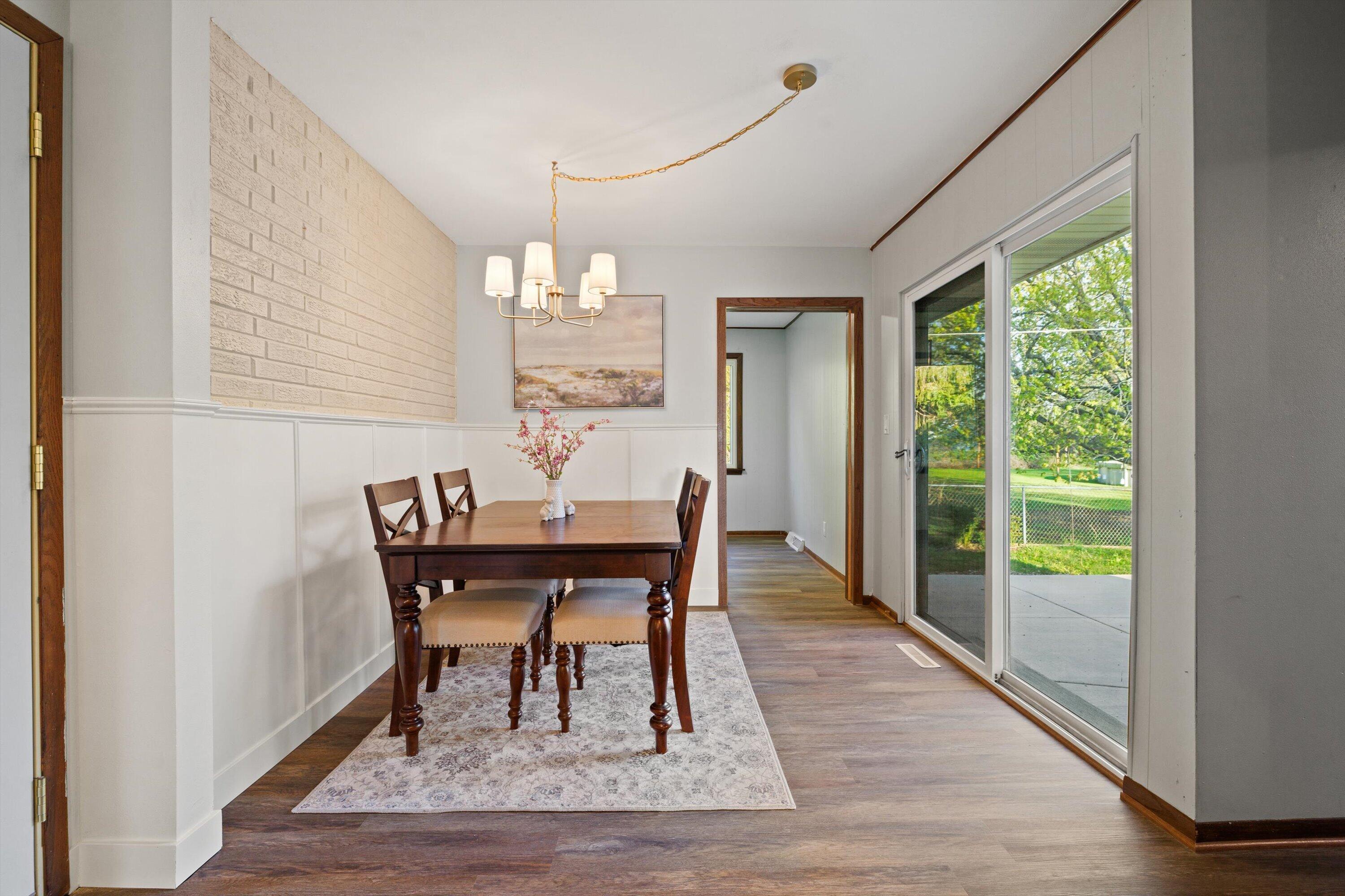 726 Royal Park Road Caledonia, WI 53402 - Photo 21 of 29 Dedicated dining space with updated lighting and natural light