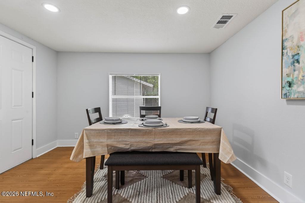 43739 Ratliff Road Callahan, FL 32011 - Photo 33 of 55 a view of a dining room with furniture