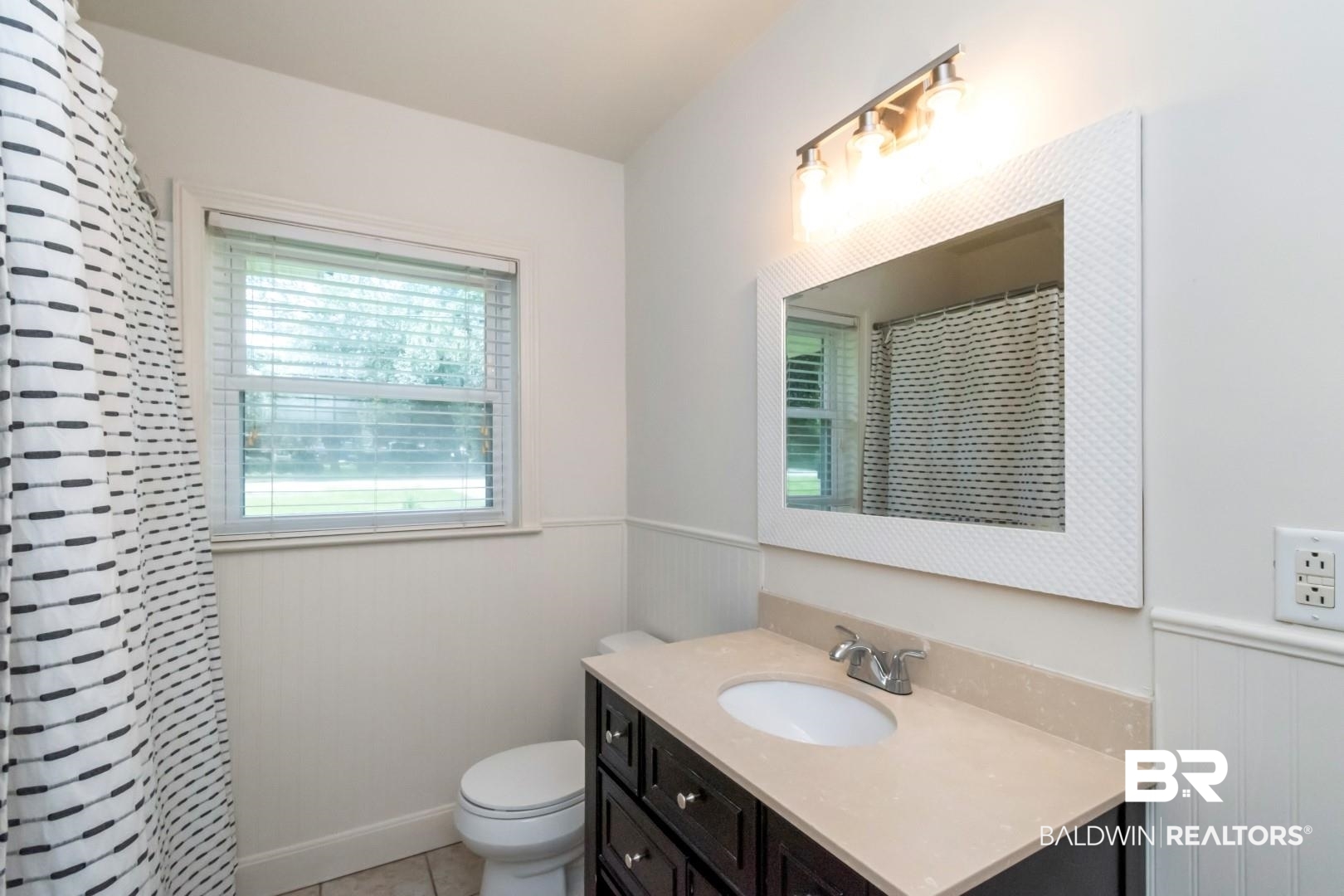 1906 Old Shell Road Mobile, AL 36607 - Photo 26 of 26 Bathroom featuring tile patterned flooring, toilet, and vanity