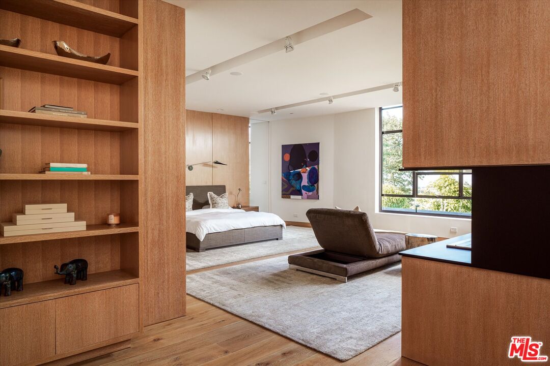 3350 Stoneridge Lane Los Angeles, CA 90077 - Photo 17 of 42 a living room with furniture and a window
