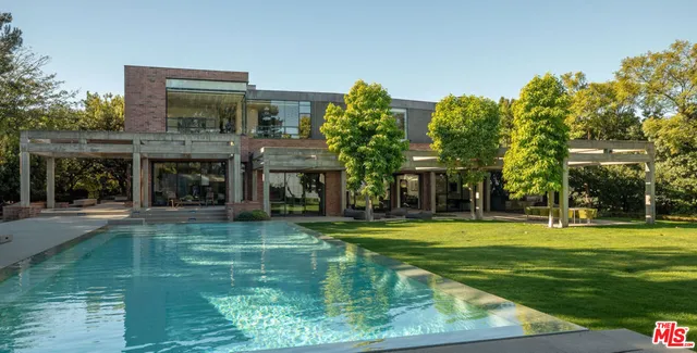 a view of a house with a swimming pool