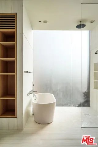 a view of a bathtub in a bathroom
