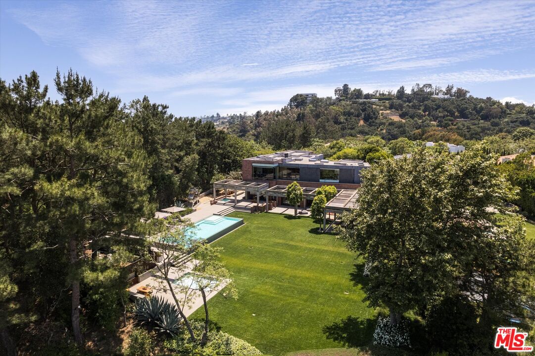 3350 Stoneridge Lane Los Angeles, CA 90077 - Photo 33 of 42 a view of a lake in middle of the forest