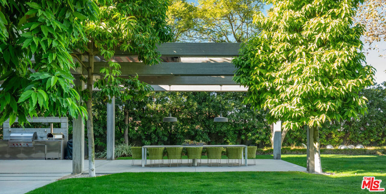 3350 Stoneridge Lane Los Angeles, CA 90077 - Photo 39 of 42 a view of yard with green space and trees in the background