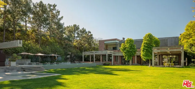 a view of a house with a swimming pool