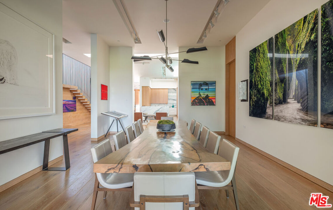 3350 Stoneridge Lane Los Angeles, CA 90077 - Photo 8 of 42 a view of a dining room with furniture window and wooden floor