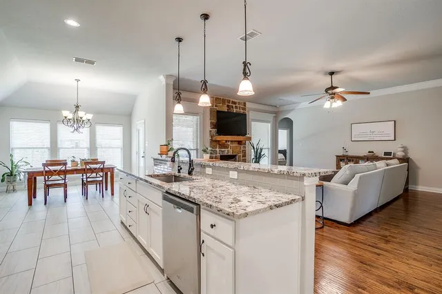 a kitchen with granite countertop lots of counter top space