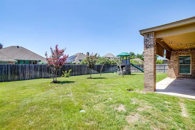a house with a tree in front of it