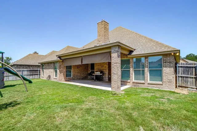 a swimming pool with wooden fence